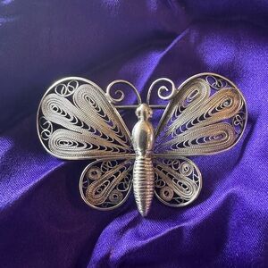 Vintage stamped silver alloy butterfly pin. Lovely wing detail. Just polished